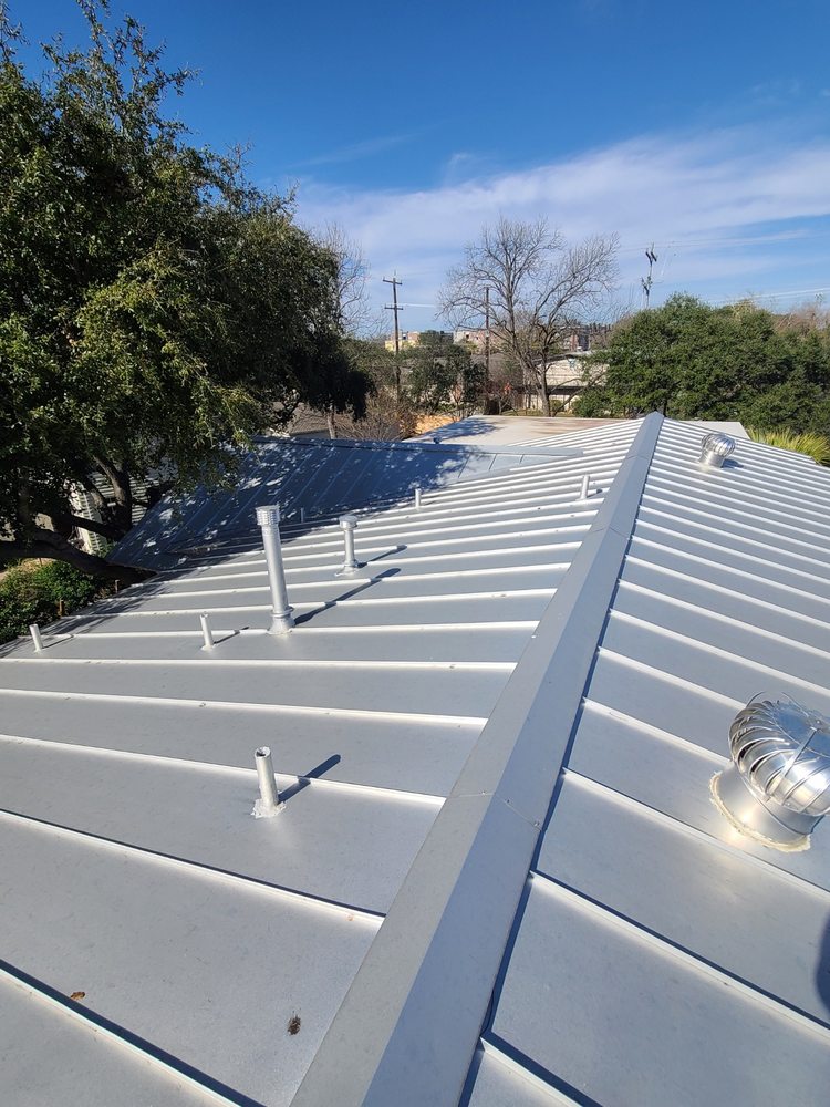 Slide of NSL Roofing Solutions
