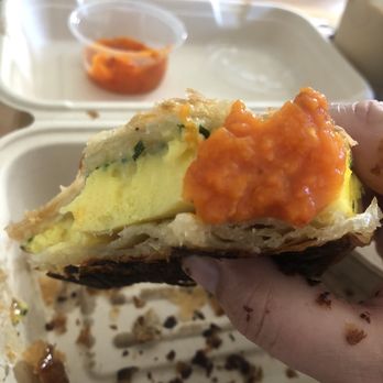 Colossus - Breakfast Sandwich: croissant, egg, and cheese with hot sauce. - Bakeries Near Me - Long Beach, California