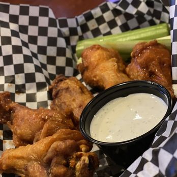 Taps Bar and Grill - Hot garlic wings. - Sports Bars Near Me - Jacksonville, Florida