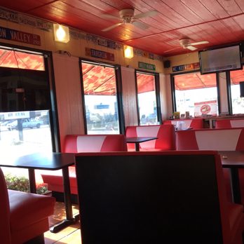 Tornado Burger - Dinning area. Cute retro theme with causal decor. Really messy though. - Burgers Near Me - Stafford, Texas Tornado Burger - Dinning area. Cute retro theme with causal decor. Really messy though. - Burgers Near Me - Stafford, Texas