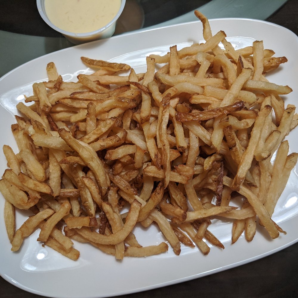 Bistro Le Bliss - Wonderful fries with lobster-infused cheddar sauce. - French Near Me - West Bloomfield, Michigan