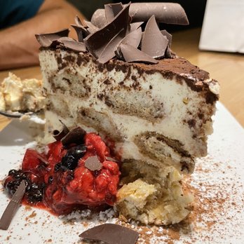 Gratzi - The amazing tiramisu my husband loved the raspberries on the side! - Italian Near Me - Midland, Michigan Gratzi - The amazing tiramisu my husband loved the raspberries on the side! - Italian Near Me - Midland, Michigan