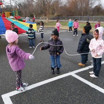 Downtown Hampton Child Development Center - Fresh air and outdoor play are critical for physical (and social) development. Children get lots of time on our huge playground. - Child Care & Day Care Near Me - Hampton, Virginia