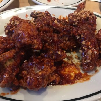 Hi Wings - 1/2 order of Sweet and Spicy chicken. 2 of us barely made a dent and had to take all this home! - Chicken Wings Near Me - Austin, Texas Hi Wings - 1/2 order of Sweet and Spicy chicken. 2 of us barely made a dent and had to take all this home! - Chicken Wings Near Me - Austin, Texas
