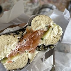 Knead Bagels - Black sesame bagel with lox, cucumbers, and capers