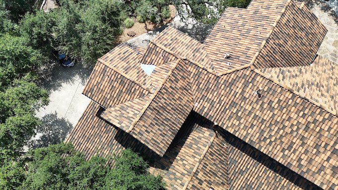 Slide of Dynamis Roofing