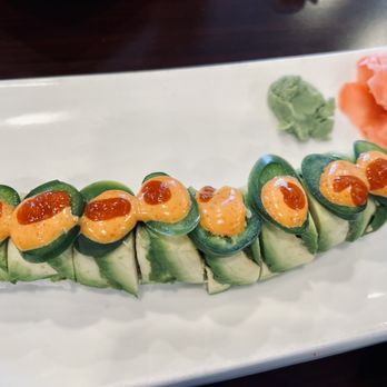 Ocean Sushi - a plate of sushi with salmon and cucumber - Sushi Bars Near Me - Liverpool, New York Ocean Sushi - a plate of sushi with salmon and cucumber - Sushi Bars Near Me - Liverpool, New York