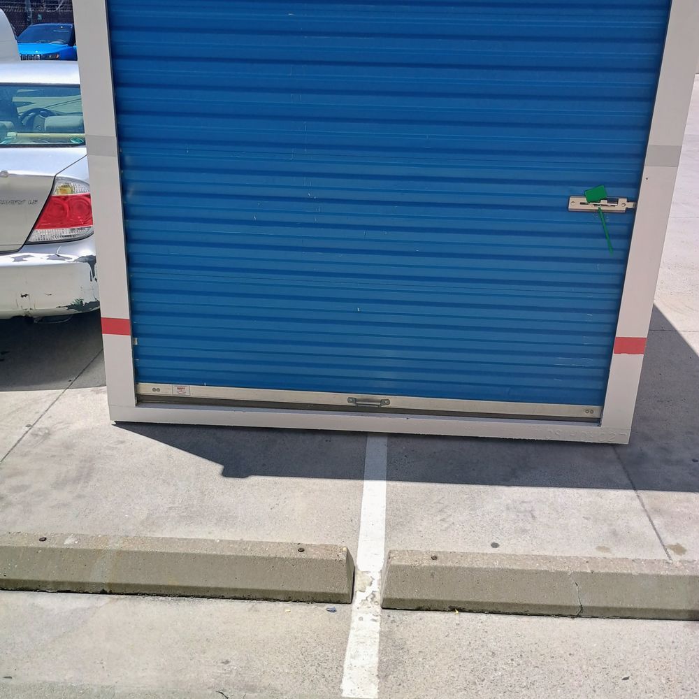 A "Pod" shipping container taking up two parking spaces, when it could have fit in one. I'm sure they'll come up with some lame excuse!