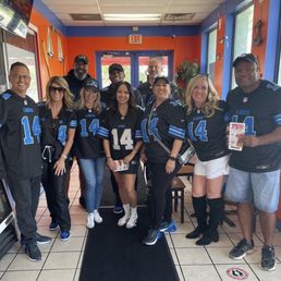 Our very large group headed to the Lions game!! Big smiles and full tummies!!