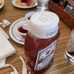 a jar of ketchup on a table