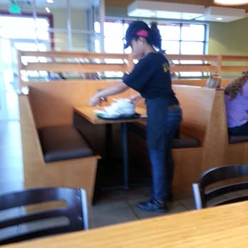 Noodles & Company - employee busing a table without having washcloth to wipe down the tables!!! - Noodles Near Me - Towson, Maryland