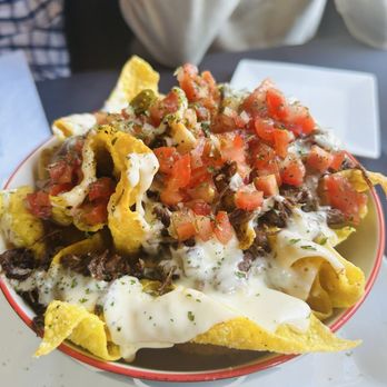 Bone-Appetite - Brisket Nachos were delicious. The chips were not traditional tortilla chips. They were more foamy like Chinese style chips. - Steakhouses Near Me - Lexington, South Carolina Bone-Appetite - Brisket Nachos were delicious. The chips were not traditional tortilla chips. They were more foamy like Chinese style chips. - Steakhouses Near Me - Lexington, South Carolina