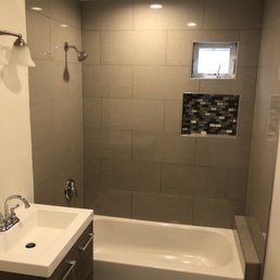 New Bathroom ... swipe Left for the "before"  Express Champion Floors is Fast & if you need help designing they got you !!