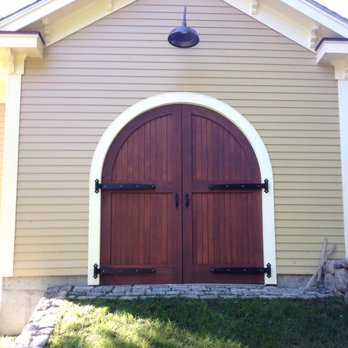 Charisma Remodeling - a door to a house - General Contractors Near Me