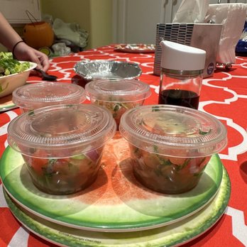 Chipotle Mexican Grill - Tomato salsa is half container full - Mexican Near Me - Irvine, California Chipotle Mexican Grill - Tomato salsa is half container full - Mexican Near Me - Irvine, California