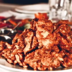 Spice Village-Southall - Pakora, also called pakodi, is a fried snack. Originally from India, it is found across South Asia.