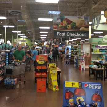 Kroger - Fast checkout sign with a line of people waiting. - Grocery Near Me - Fort Wayne, Indiana