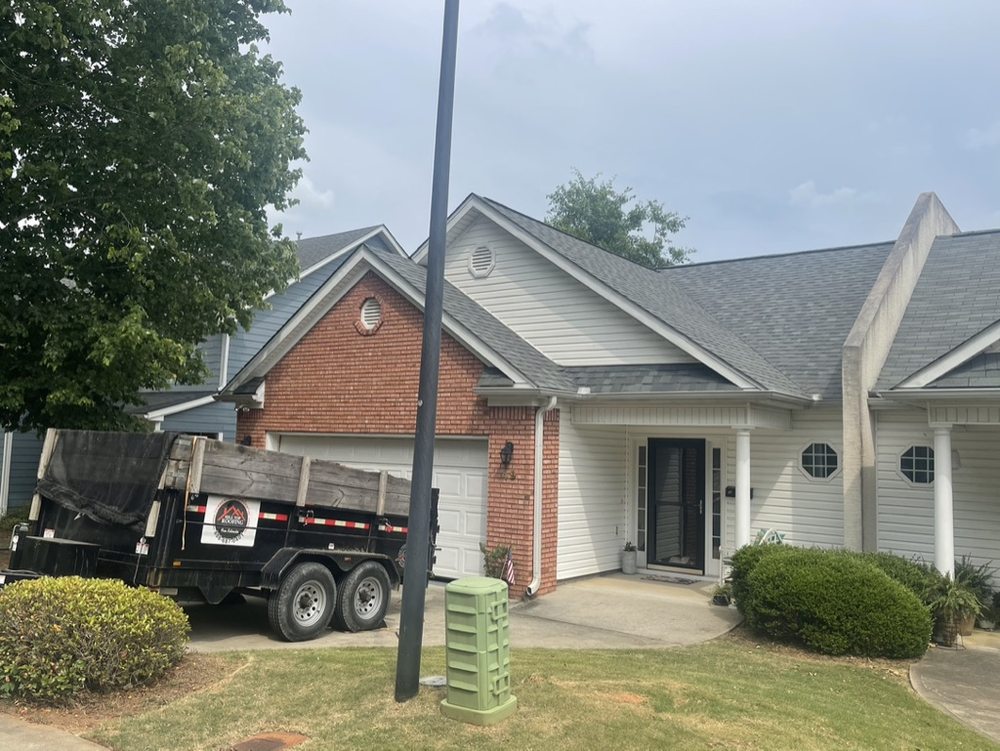 Slide of Hill Top Roofing