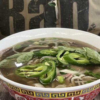 Pho 87 - Large bowl of Pho with steak, beef balls, tripe and one other meat - Vietnamese Near Me - Los Angeles, California