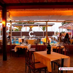Caminito - The view from inside the restaurant facing the pool.