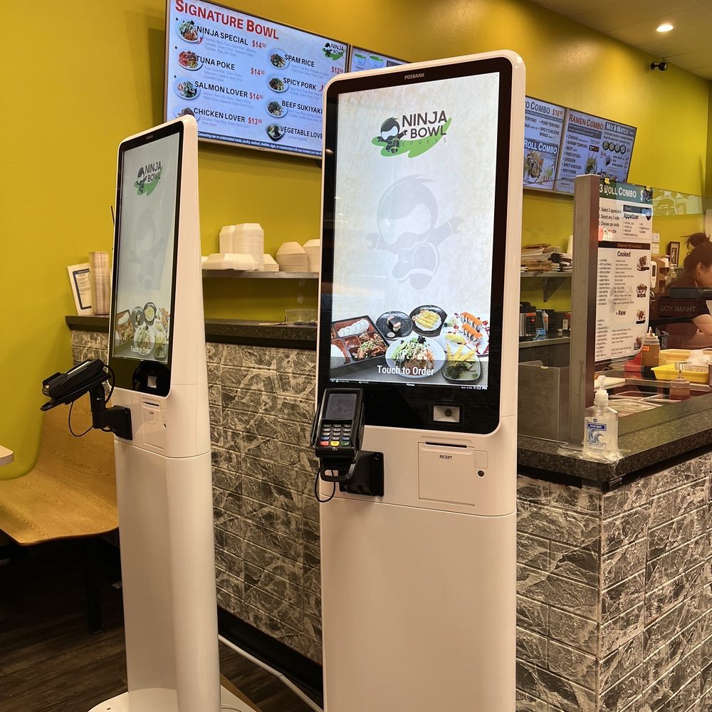 a digital kiosk in a restaurant a digital kiosk in a restaurant