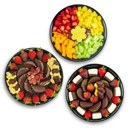 Edible Arrangements - Thank your team or celebrate your clients with this shareable indulgent platter bundle of fresh and decadent chocolate Dipped Fruit™!