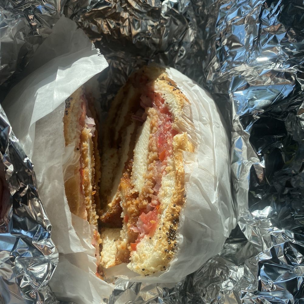 Compton's - chicken cutlet with onion and tomato. Deliciousness - Sandwiches Near Me - Astoria, New York