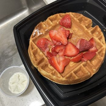 Black Bear Diner Las Vegas - Tropicana Ave - What I got.  Beautiful looking waffle with really delicious looking strawberries but where's the cream??? - Diners Near Me - Las Vegas, Nevada