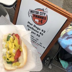 Motor City Franks - I think it's called the Michigan. It has cucumbers, tomatoes onions yellow peppers and I added mustard. Pretty good  5 bucks.