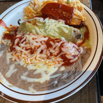 Chihuahua's Cantina & Grill - Builder owned combo platter with pork tamale, beef enchilada, chili Chiles Rellenos - Mexican Near Me - Reno, Nevada Chihuahua's Cantina & Grill - Builder owned combo platter with pork tamale, beef enchilada, chili Chiles Rellenos - Mexican Near Me - Reno, Nevada