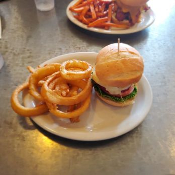 The Brakeman American Grill - Oregon Burger with onion rings - Burgers Near Me - Victor, Idaho The Brakeman American Grill - Oregon Burger with onion rings - Burgers Near Me - Victor, Idaho
