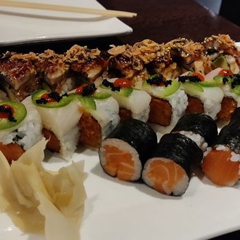 Kabuto - Rolls front to back: Salmon, Kiss of Fire, and Black Dragon - Sushi Bars Near Me - Rockville, Maryland Kabuto - Rolls front to back: Salmon, Kiss of Fire, and Black Dragon - Sushi Bars Near Me - Rockville, Maryland