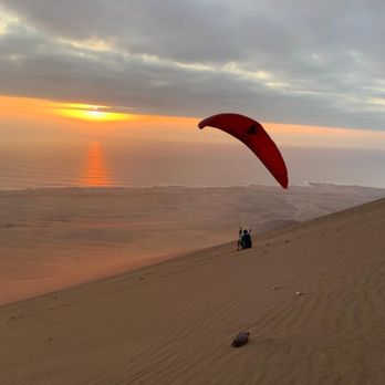Astro Paragliding - Sunset slides at Palo Buque Chile - Flight Instruction Near Me - Bend, Oregon