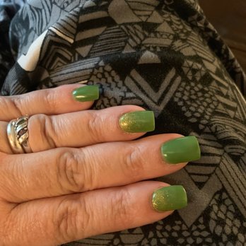 Island Nails - Green with a gold ombré on the ring and pointer fingers. The picture doesn't do justice! - Nail Salons Near Me - Jacksonville, Florida