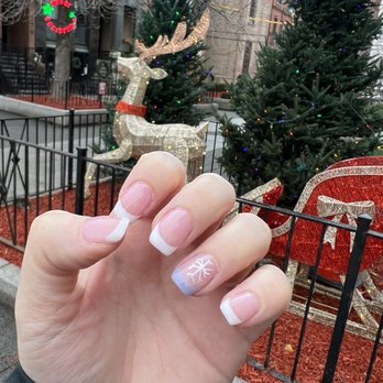 Old Town Nails - French dip nails with one gel nail snowflake by Jasmine - Nail Salons Near Me - Chicago, Illinois