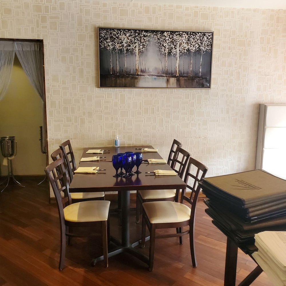 Aozora - a dining room with a table and chairs - Japanese Near Me - Montclair, New Jersey Aozora - a dining room with a table and chairs - Japanese Near Me - Montclair, New Jersey