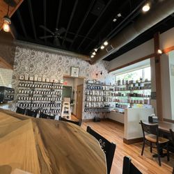 International Tea and Coffee Company - Tea wall, shopping area, and part of the bar.
