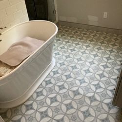 Jim Stellabuto's Everything Under Foot - Bathroom tile floor done by one of our installers!