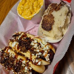 Loaded hot dogs , mac and mashed potatoes