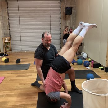 Hot House Yoga - Helping each other. - Yoga Near Me - Ormond Beach, Florida