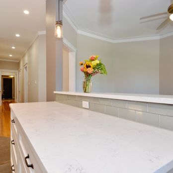 Foster Green Design Build - a kitchen with marble countertops - General Contractors Near Me - Streamwood, Illinois Foster Green Design Build - a kitchen with marble countertops - General Contractors Near Me - Streamwood, Illinois