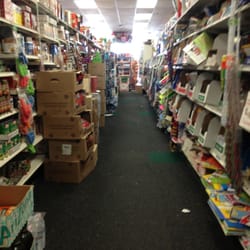 Dollar Tree - Sloppy boxes stacked in the aisles, making them even narrower