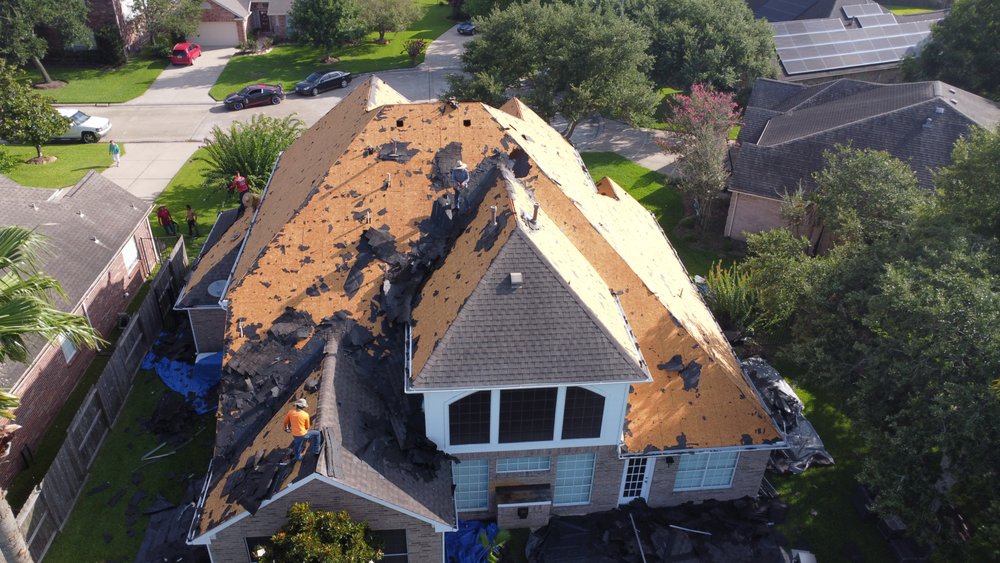 Slide of All The Way Up Roofing & Construction