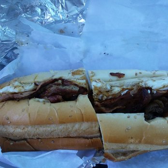 Turnpike Bagels Deli & Bakery - a half eaten sandwich - Bagels Near Me - Levittown, New York Turnpike Bagels Deli & Bakery - a half eaten sandwich - Bagels Near Me - Levittown, New York