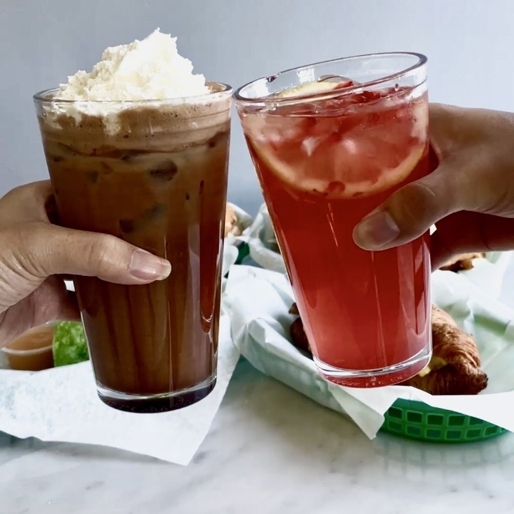 Brew Bytes Cafe - Iced Zebra Mocha (left) & 16 oz. Fresh Strawberry Lemonade (right) - Coffee & Tea Near Me - Cupertino, California Brew Bytes Cafe - Iced Zebra Mocha (left) & 16 oz. Fresh Strawberry Lemonade (right) - Coffee & Tea Near Me - Cupertino, California
