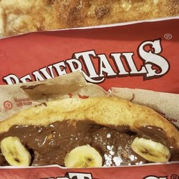 a hot dog with chocolate and banana slices