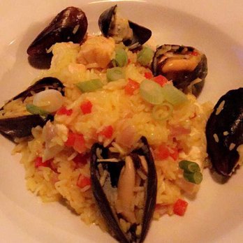 Bear & Bottle - Fish of the Day Paella...white fish, bacon, smoked chicken, and PEI Mussels. They forgot the bacon and smoked chicken. - Pubs Near Me - Madison, Wisconsin