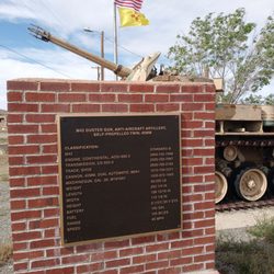 Veterans Park - On both sides of these Brick Structures are Informational Plaques about the Military Weapons of War on display.