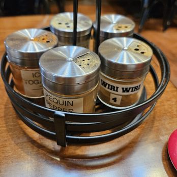 Curry Hyuga - different pepper shakers...warning!...some are super spicy! - Japanese Curry Near Me - Burlingame, California