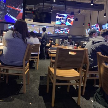 Buffalo Wild Wings - tables literally touching as people eat - American Near Me - Lexington, Kentucky Buffalo Wild Wings - tables literally touching as people eat - American Near Me - Lexington, Kentucky